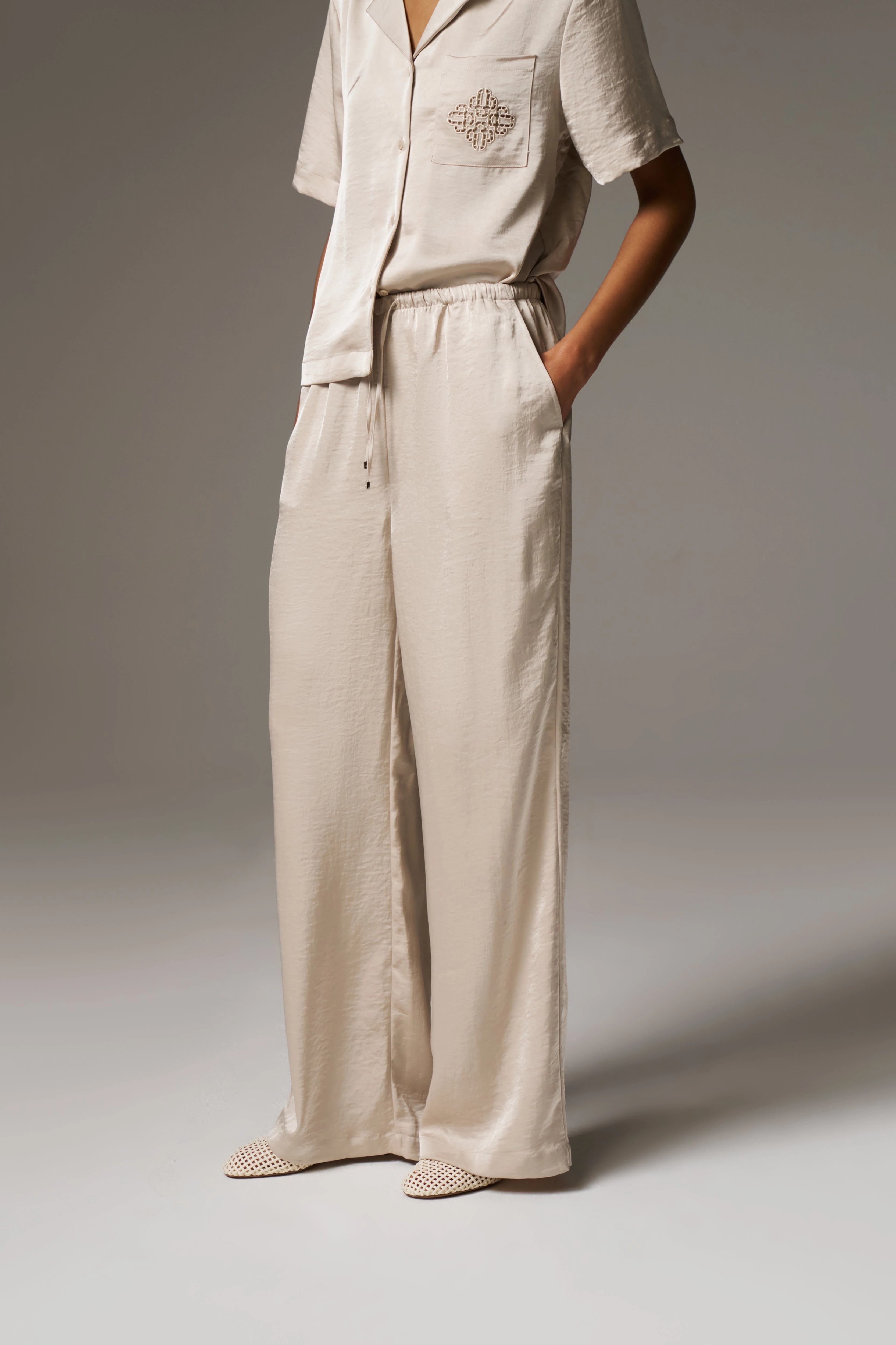 SATIN WIDE LEG EMBLEM TROUSERS - BEIGE